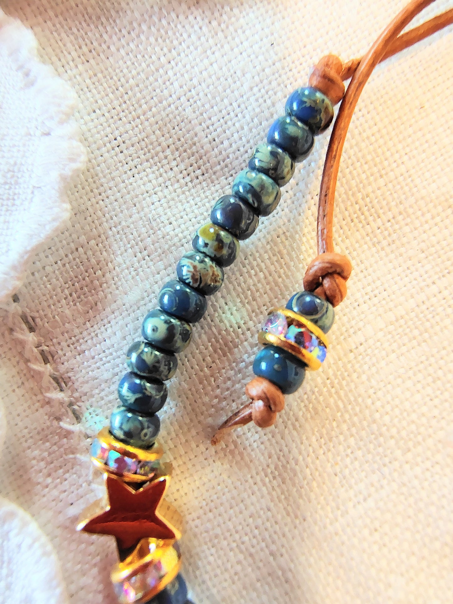 Our Lady of Guadalupe adjustable handmade bracelet with Cobalt blue or teal Miyuki Picasso beads and aaa Crystal rondeles, .5mm leather cord
