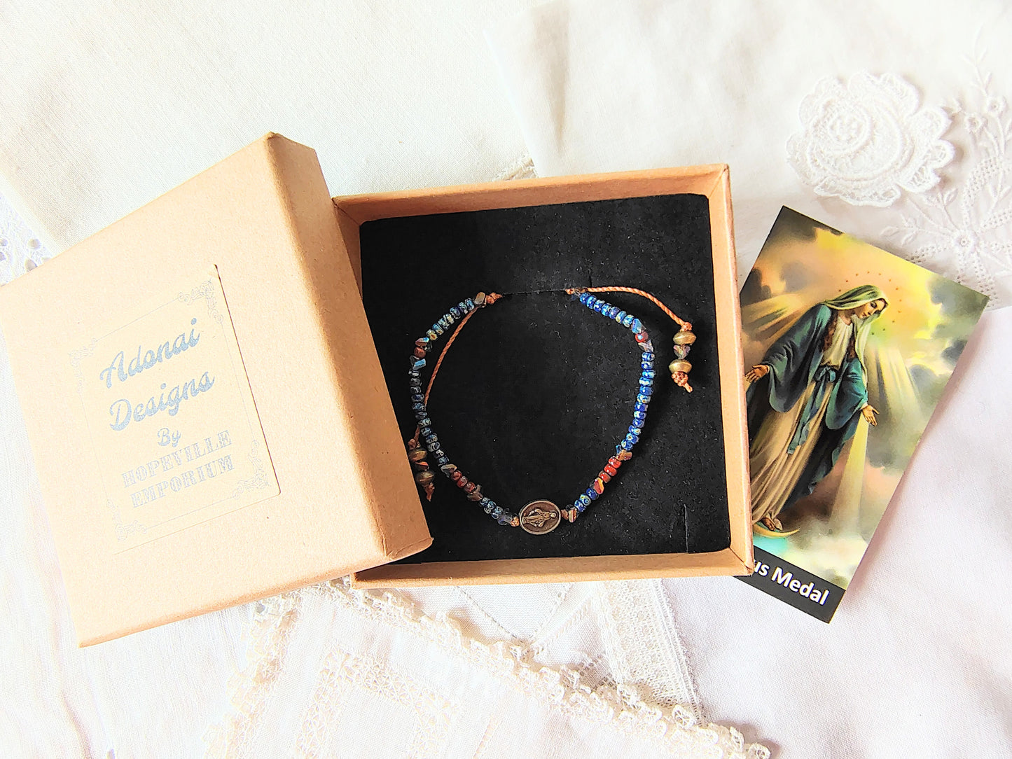 Miraculous Medal adjustable handmade bracelet with Cobalt blue Miyuki beads, red opaque Picasso Beads and Multi-colored pyramid beads