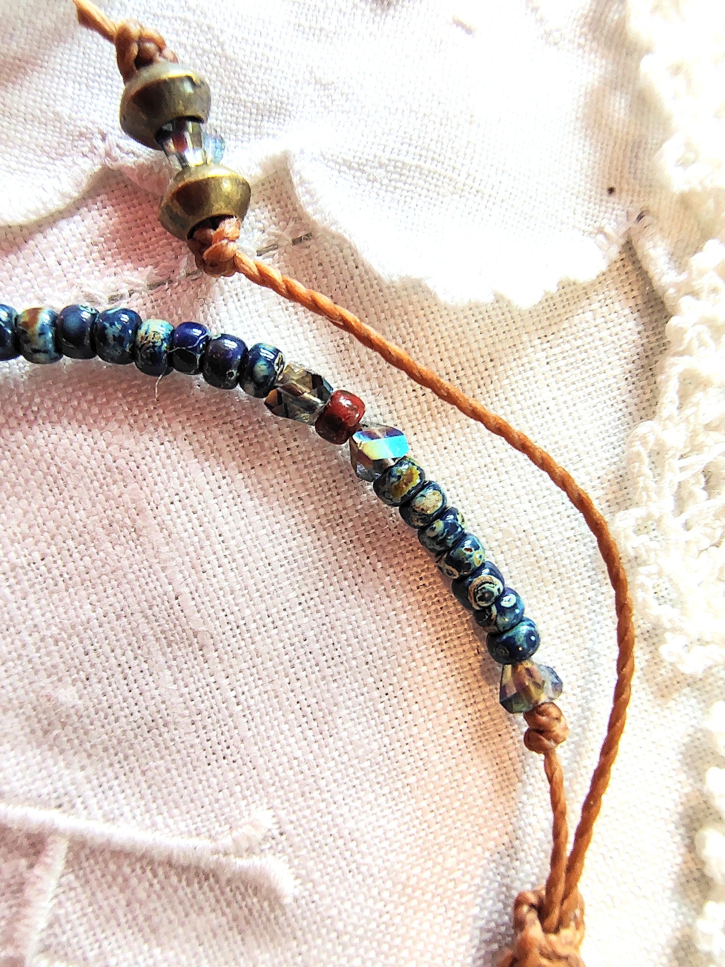 Miraculous Medal adjustable handmade bracelet with Cobalt blue Miyuki beads, red opaque Picasso Beads and Multi-colored pyramid beads