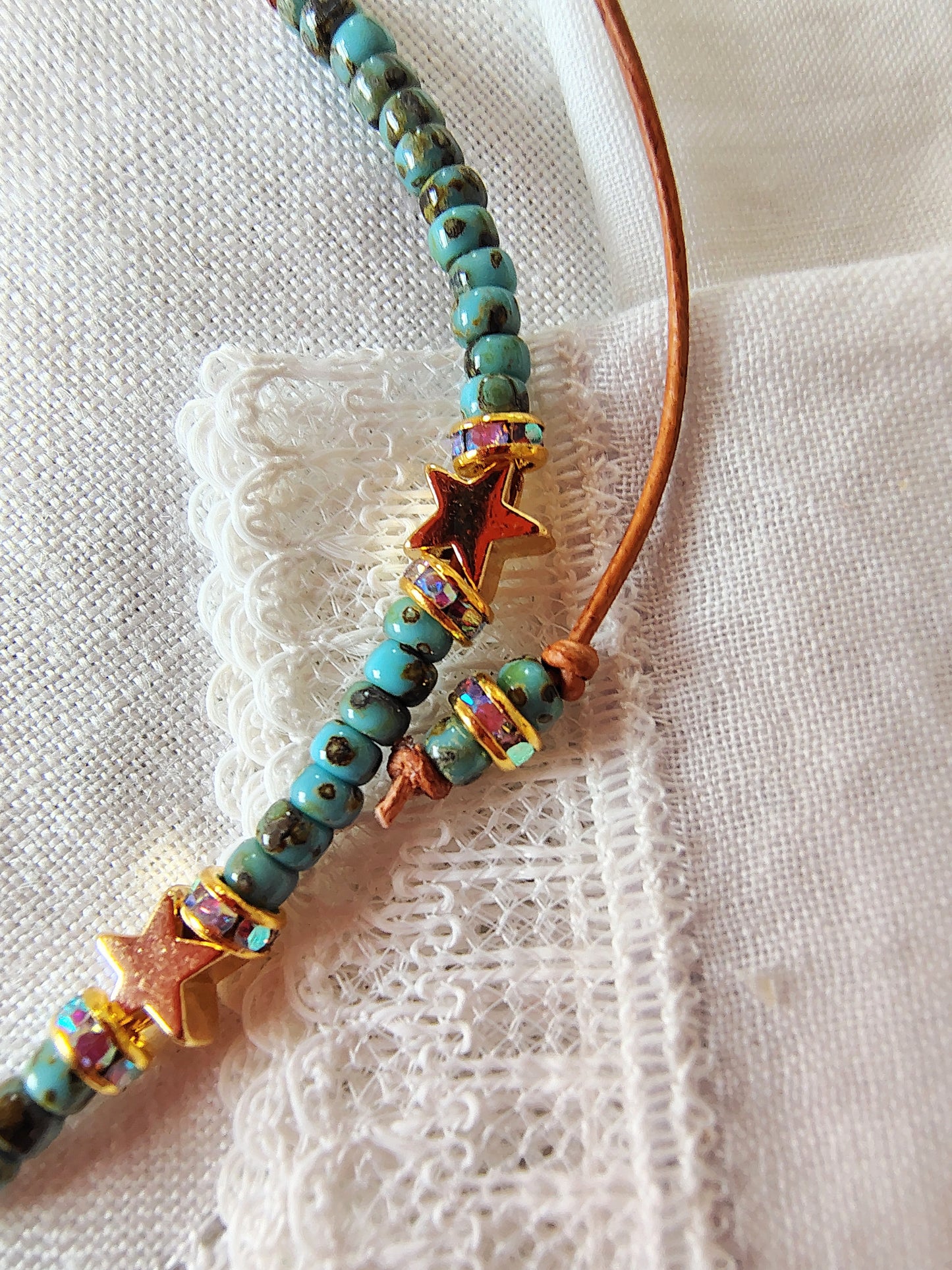 Our Lady of Guadalupe adjustable handmade bracelet with Cobalt blue or teal Miyuki Picasso beads and aaa Crystal rondeles, .5mm leather cord