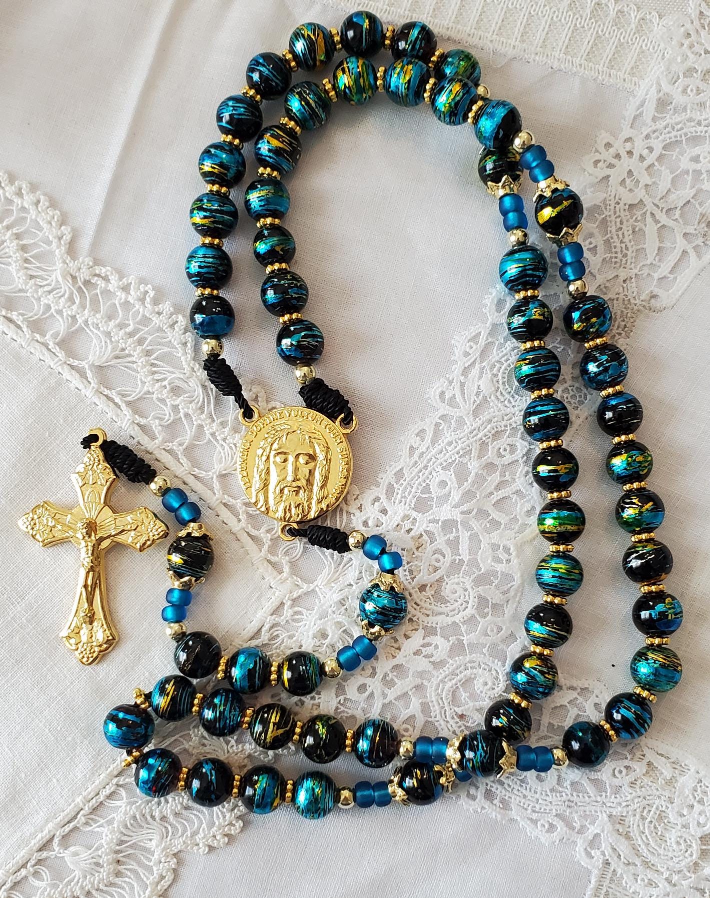 Hand-Knotted Rosary Imported Italian Gold Crucifix, Shroud of Turin Centerpiece Draw bench metallic glass black rosary cord prayer card