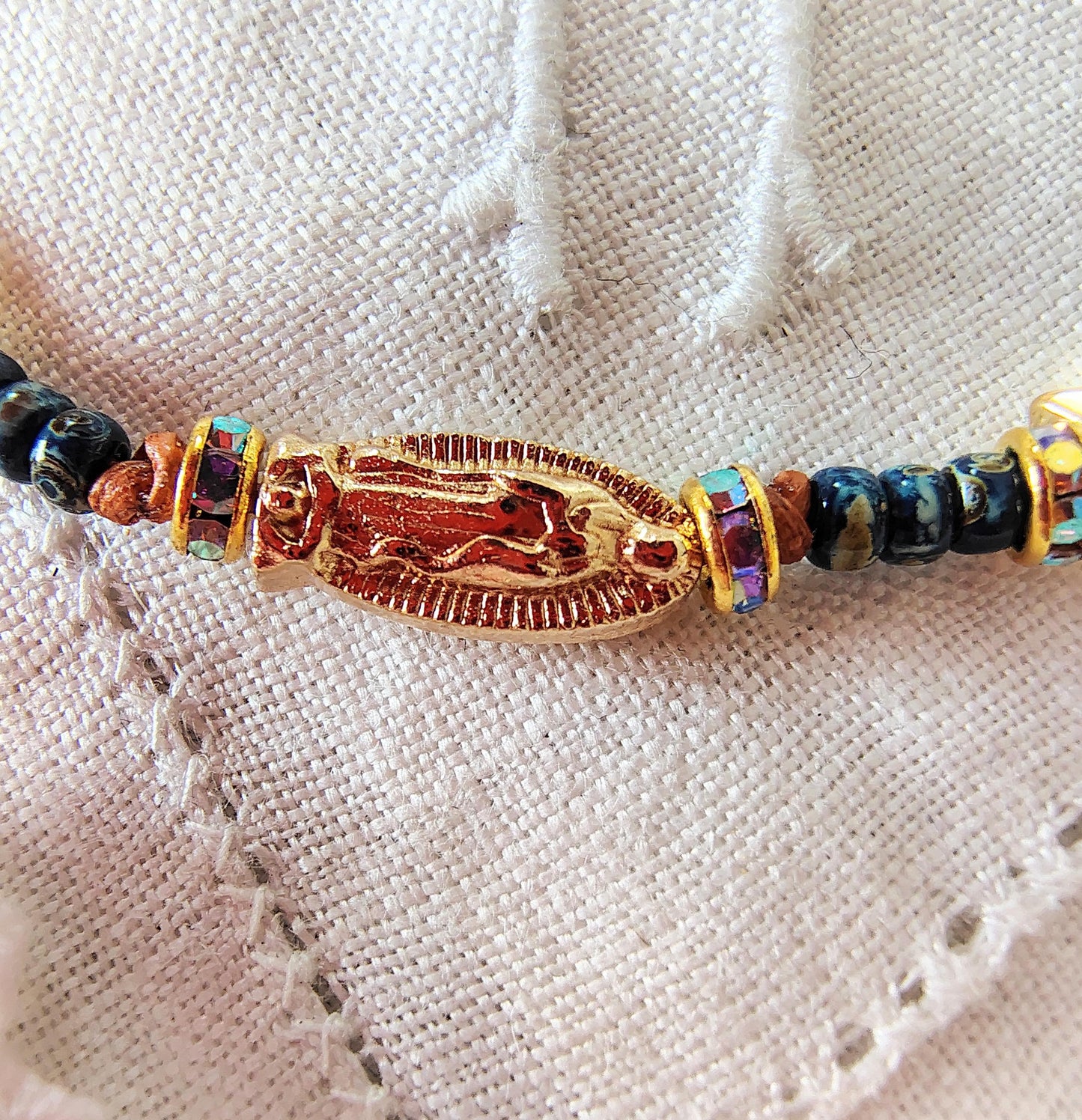 Our Lady of Guadalupe Bracelet: Miyuki Picasso Beads, AAA Crystal Rondelles leather Cord star shaped Gold tone beads sacred bead numbers.