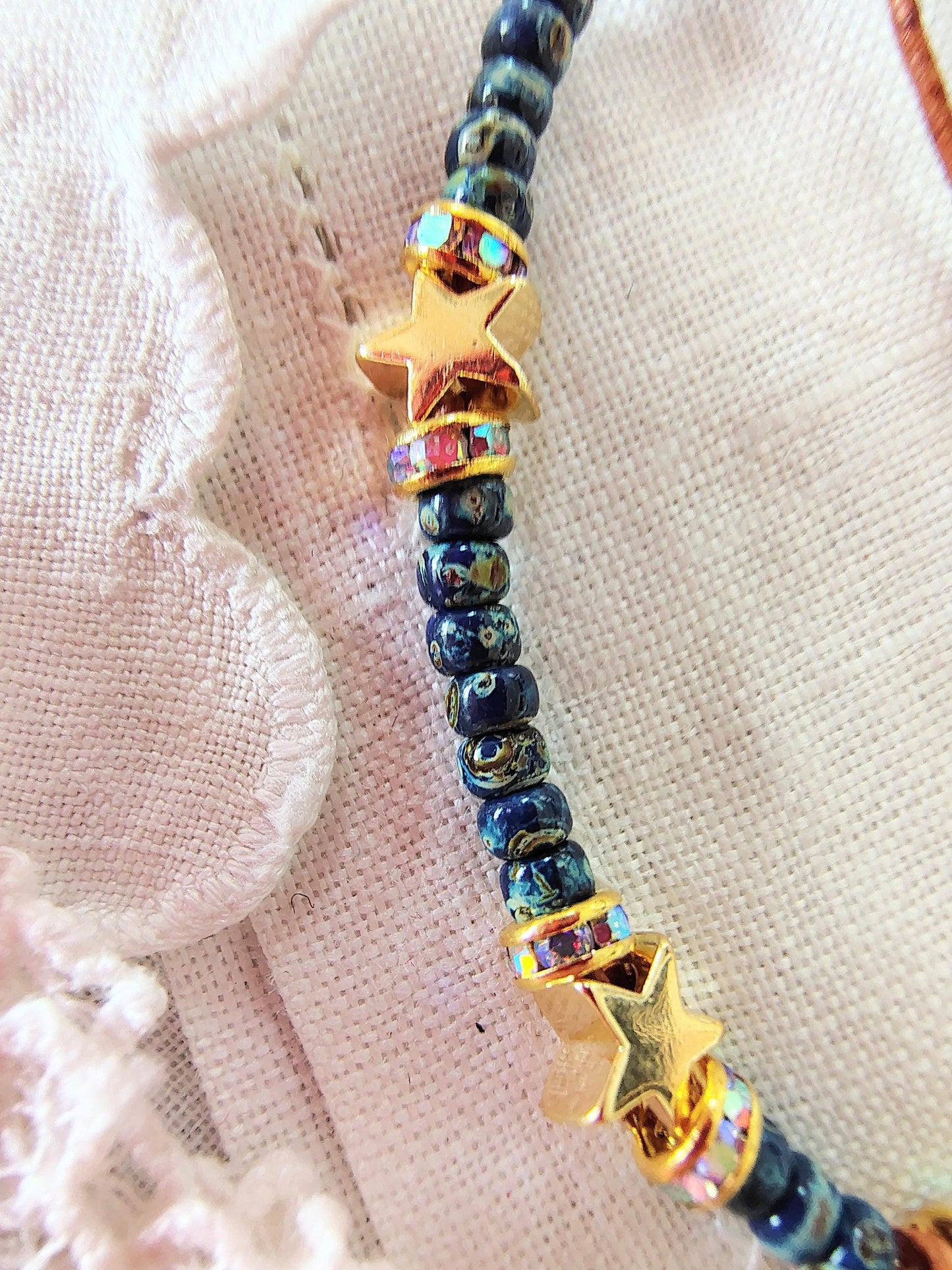 Our Lady of Guadalupe Bracelet: Miyuki Picasso Beads, AAA Crystal Rondelles leather Cord star shaped Gold tone beads sacred bead numbers.