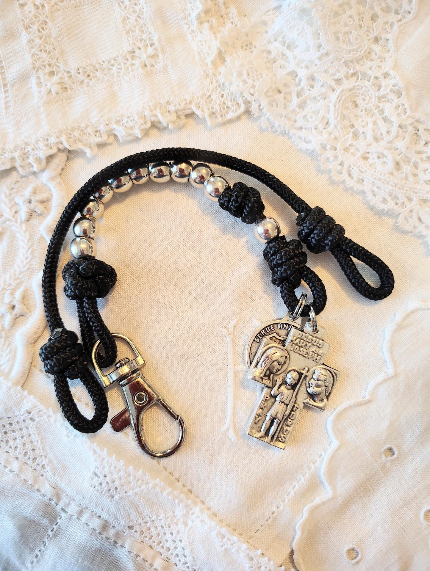 Rosary paracord police protection sheriff tenner prayer beads Saint Michael ice border patrol Saint Benedict crucifix spiritual warfare gift