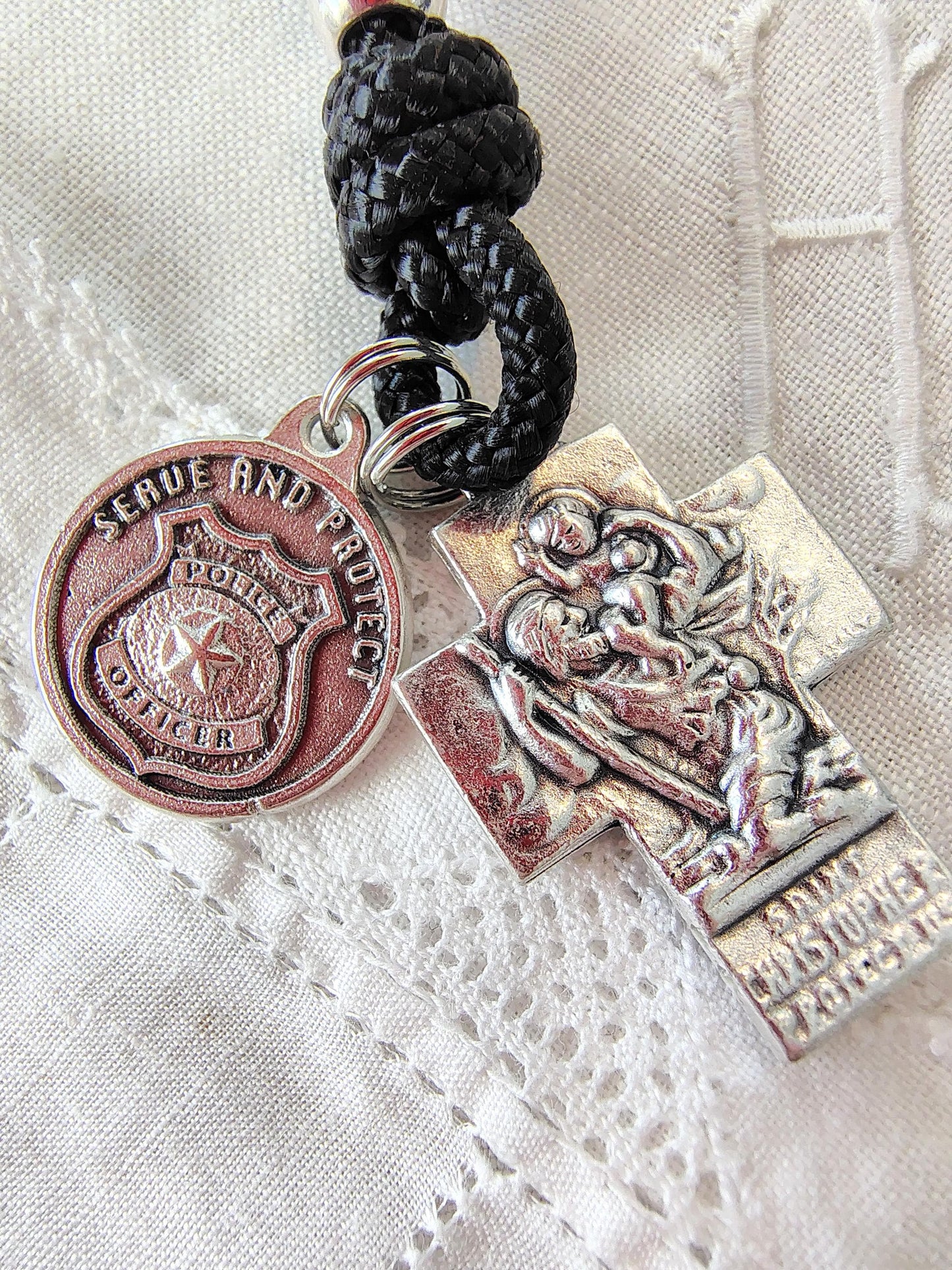 Rosary paracord police protection sheriff tenner prayer beads Saint Michael ice border patrol Saint Benedict crucifix spiritual warfare gift