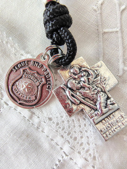 Rosary paracord police protection sheriff tenner prayer beads Saint Michael ice border patrol Saint Benedict crucifix spiritual warfare gift