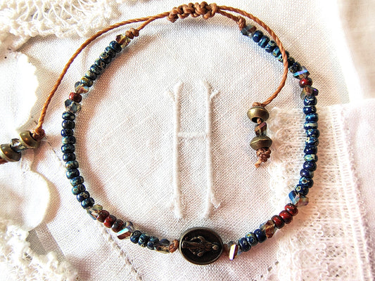 Miraculous Medal adjustable handmade bracelet with Cobalt blue Miyuki beads, red opaque Picasso Beads and Multi-colored pyramid beads