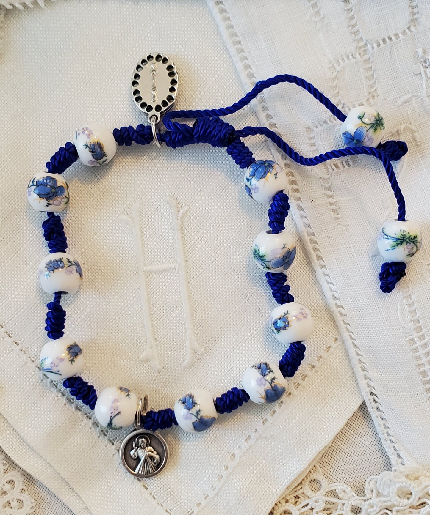 Hand Made Knotted Blue Floral Ceramic Rosary bracelet with Fatima Charm