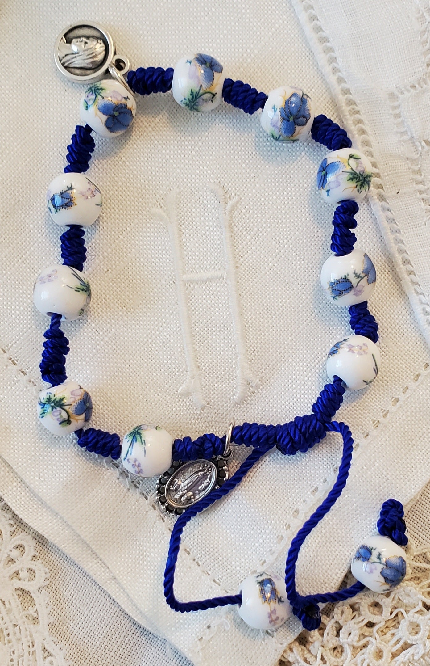 Hand Made Knotted Blue Floral Ceramic Rosary bracelet with Fatima Charm